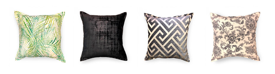 Collection of four scatter cushions in a cream, black and green colour scheme